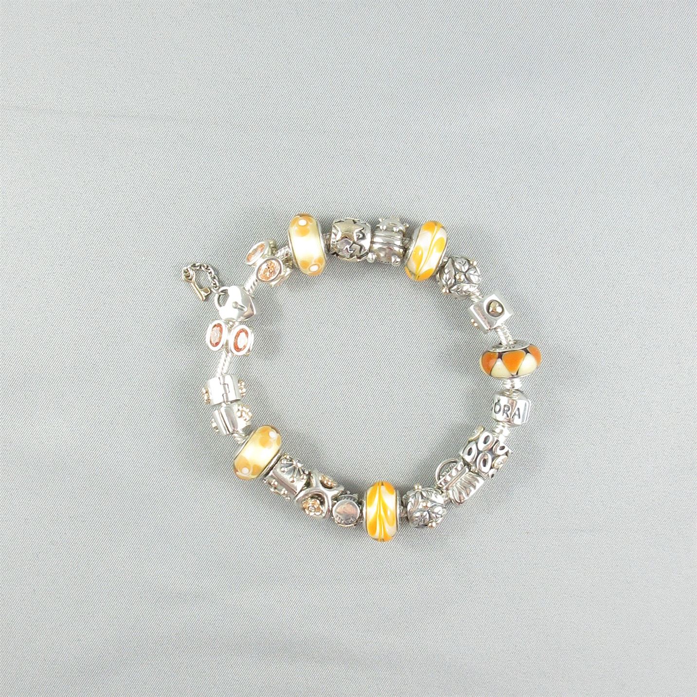 PANDORA silver bracelet and charms - La Boîte à Bijoux