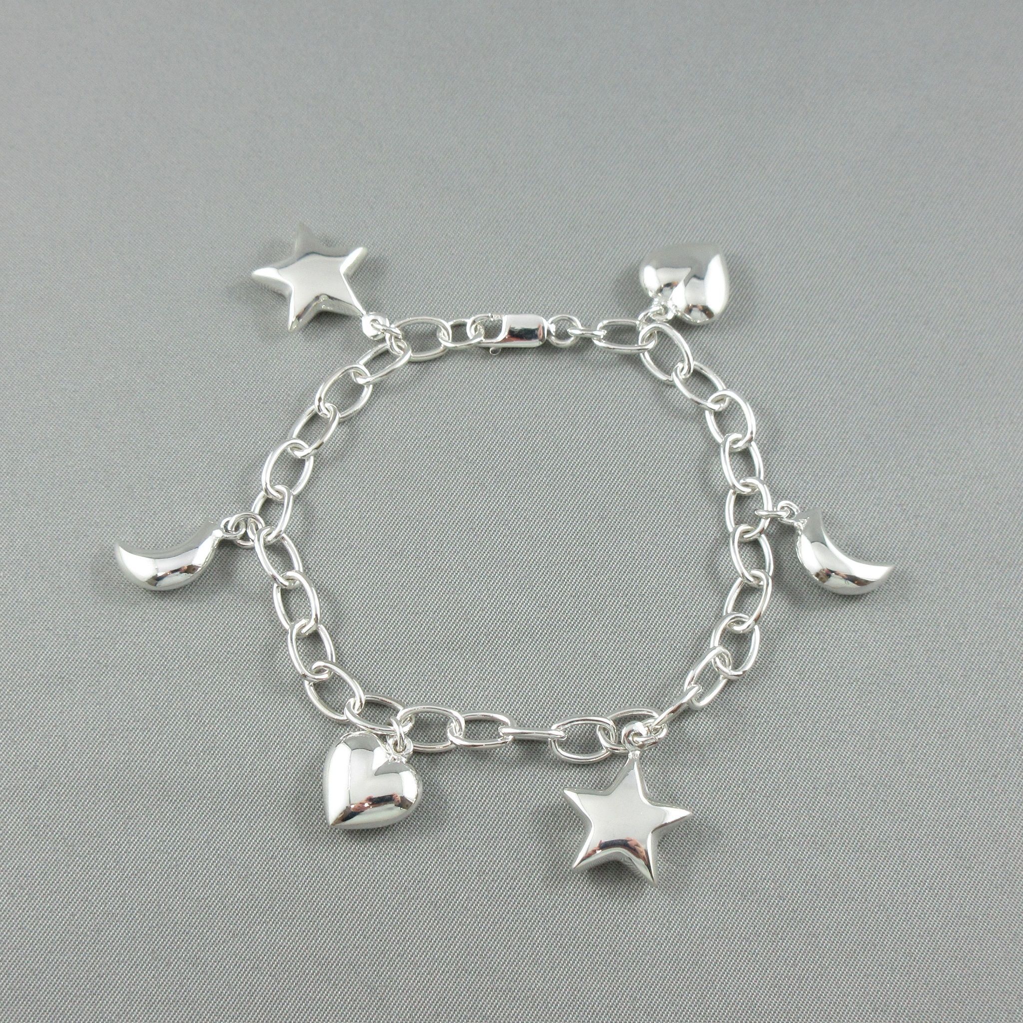 Silver bracelet and charms