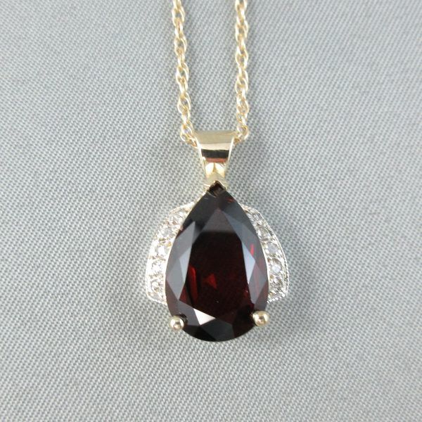 Garnet and diamonds, 10K gold pendant