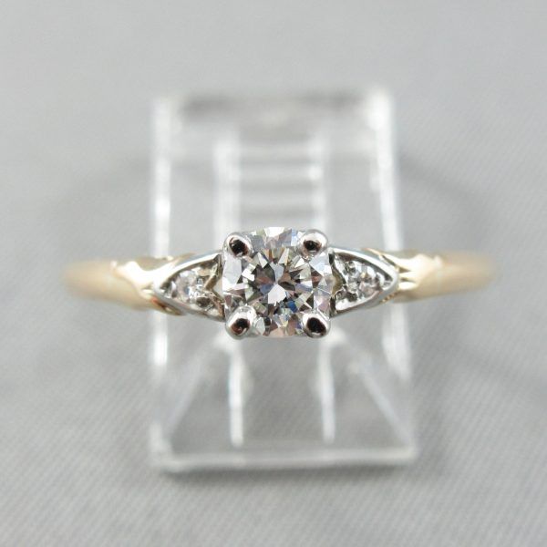 3 diamonds, 14K yellow gold and 18K white gold ring