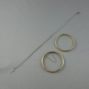 2 baby bracelets and cross with chain