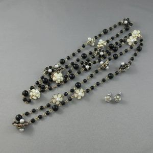 Long necklace and stud earrings, imitation pearls
