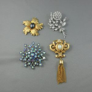 4 brooches
