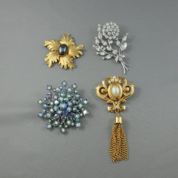 4 brooches